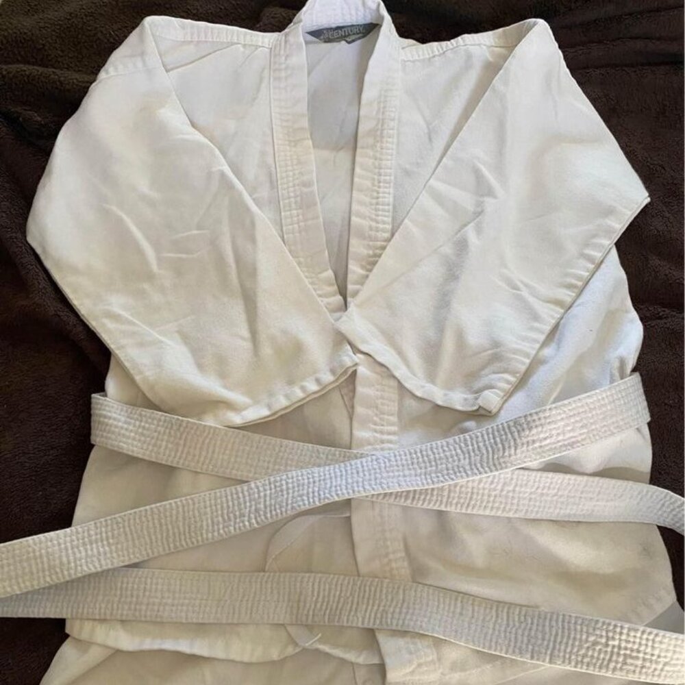 Kids unisex Size 2 karate uniform. White. Minor Stains. Good condition.